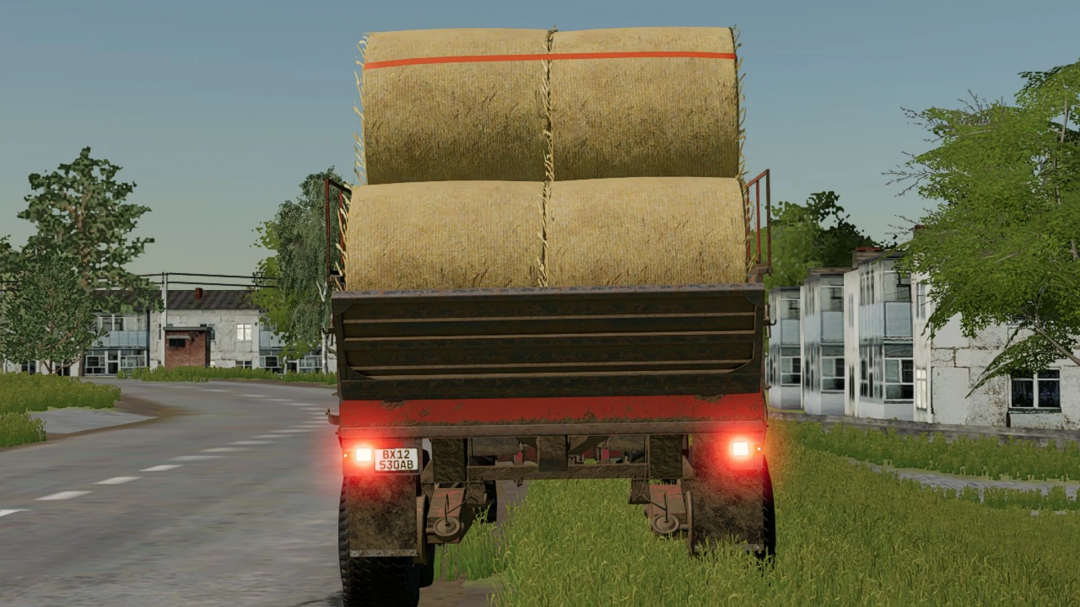 Rear view of PRT-10 trailer carrying hay bales in FS22 mod, Farming Simulator 22.