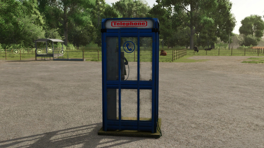 FS25 mod Phonebooth Teleporter v1.0.0.0 in a rural setting with trees and fences.