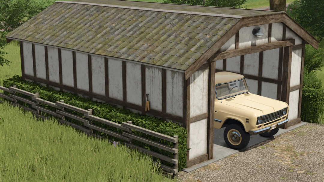 FS25 mod Place Fences Anywhere v1.0.0.0 shows a vehicle parked in a rustic shed with wooden fences surrounding it.