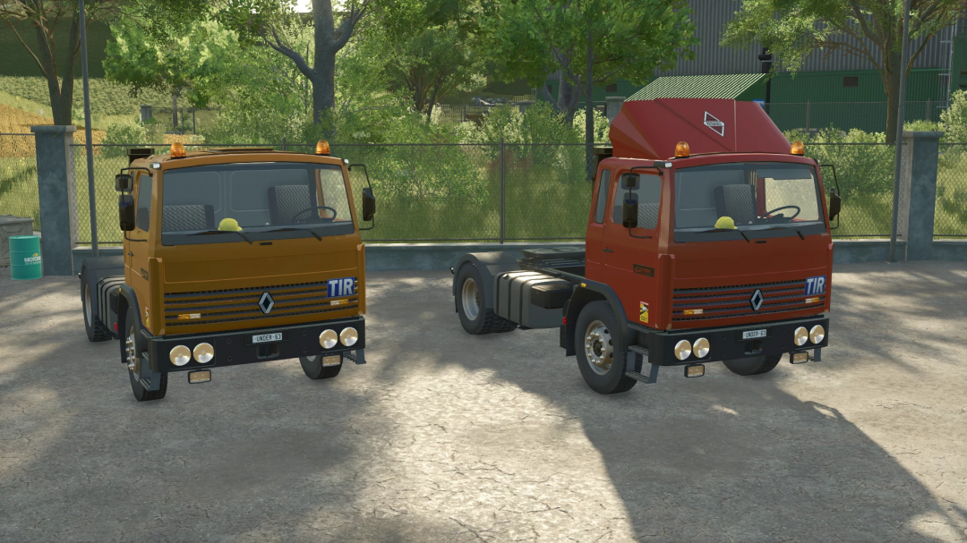 Two Renault G210 semi-trucks in FS25 mod, parked outdoors with trees in the background. Farming Simulator 25 mods.