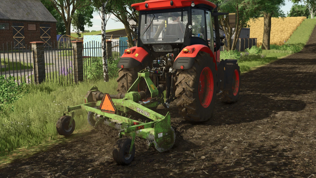 Red tractor using SRW 800 Stone Windrower in FS25 mod, Farming Simulator 25.