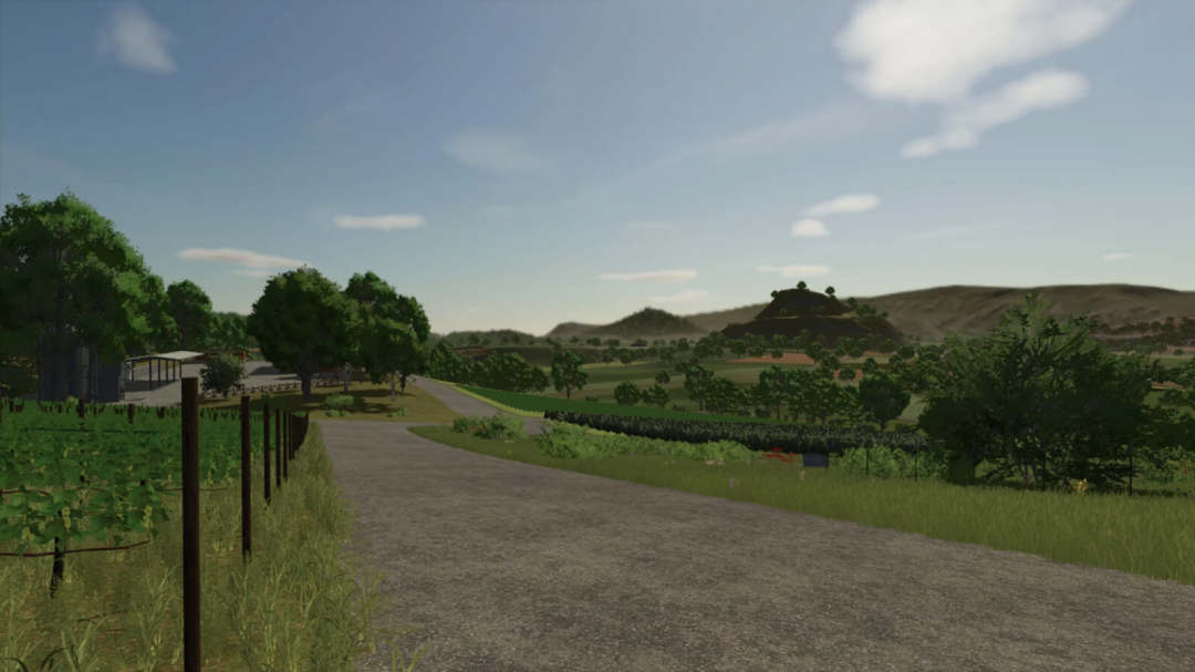 FS25 mod 'The Memory' landscape with fields, road, and distant hills.