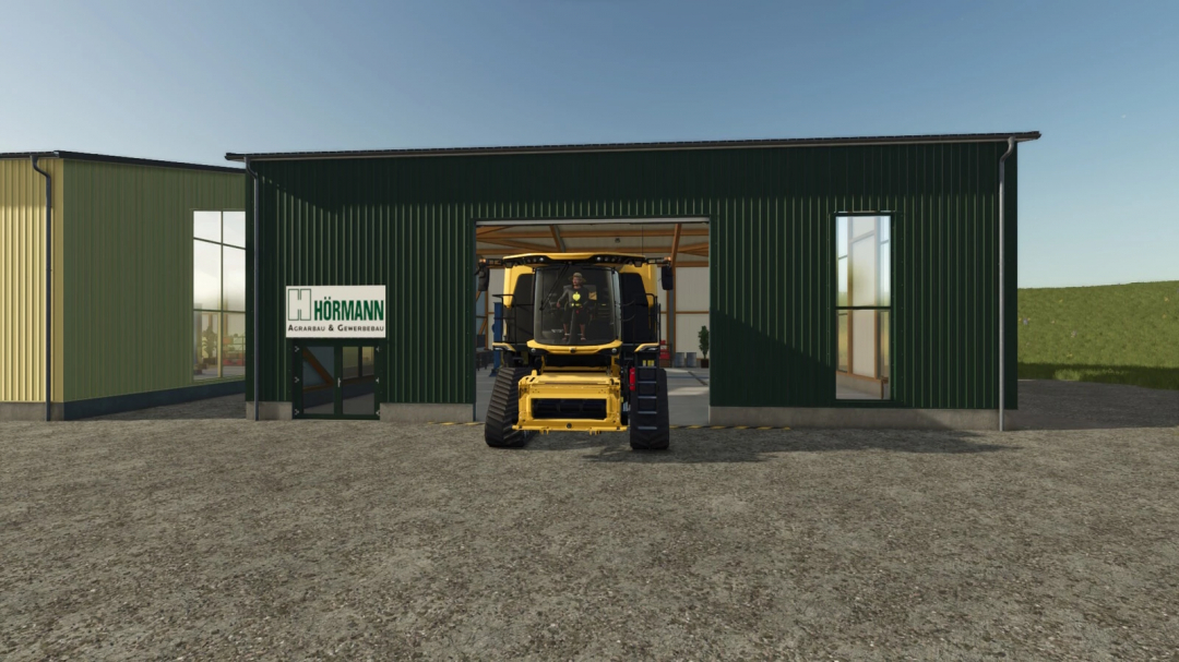 FS25 mod Workshop v1.0.0.0: Green building with a tractor at the entrance, showcasing Farming Simulator 25 gameplay.