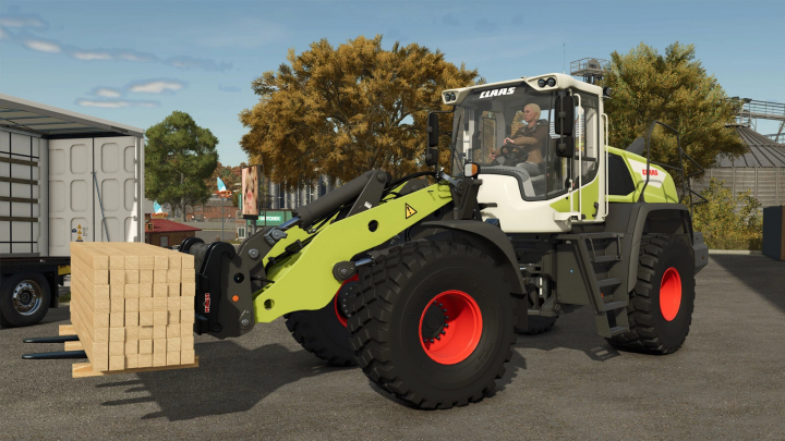 fs25-mods,  CLAAS TORION 1914 loader carrying wooden pallets in FS25 mod.