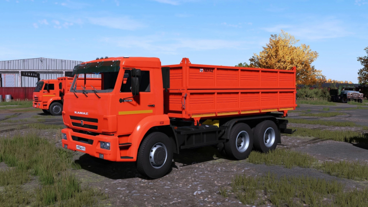 fs22-mods,  FS22 mod Kamaz 45143 v1.6.0.0, a bright orange truck on a farm setting in Farming Simulator 22.