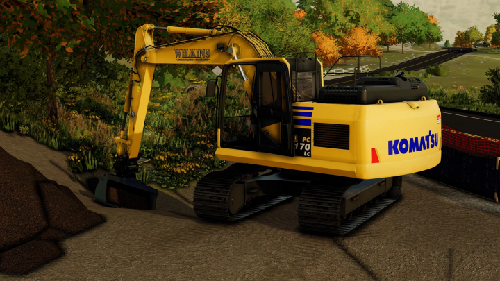 fs22-mods,  Komatsu PC 170 excavator mod in FS22, working in a lush forest area. Farming Simulator 22 mods enhance gameplay realism.