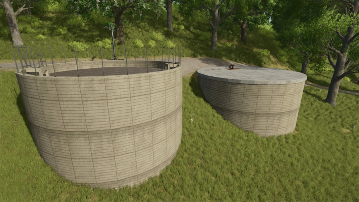 fs25-mods,  FS25 mods image showing two large slurry tanks on grassy terrain.