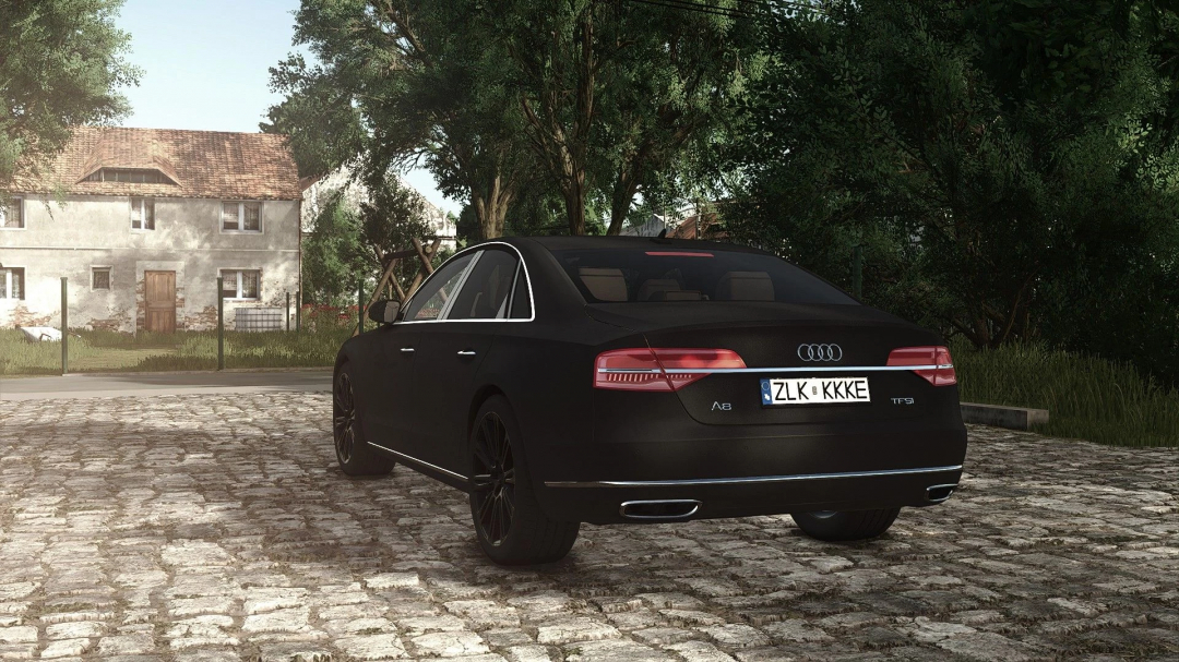 Audi A8 parked on cobblestone in Farming Simulator 25 mod, surrounded by trees and rustic house.