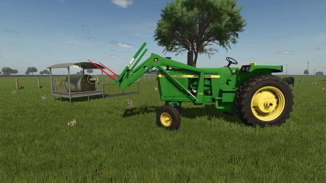 FS25 mods: Green tractor with front loader near beef cattle pasture in Farming Simulator 25.