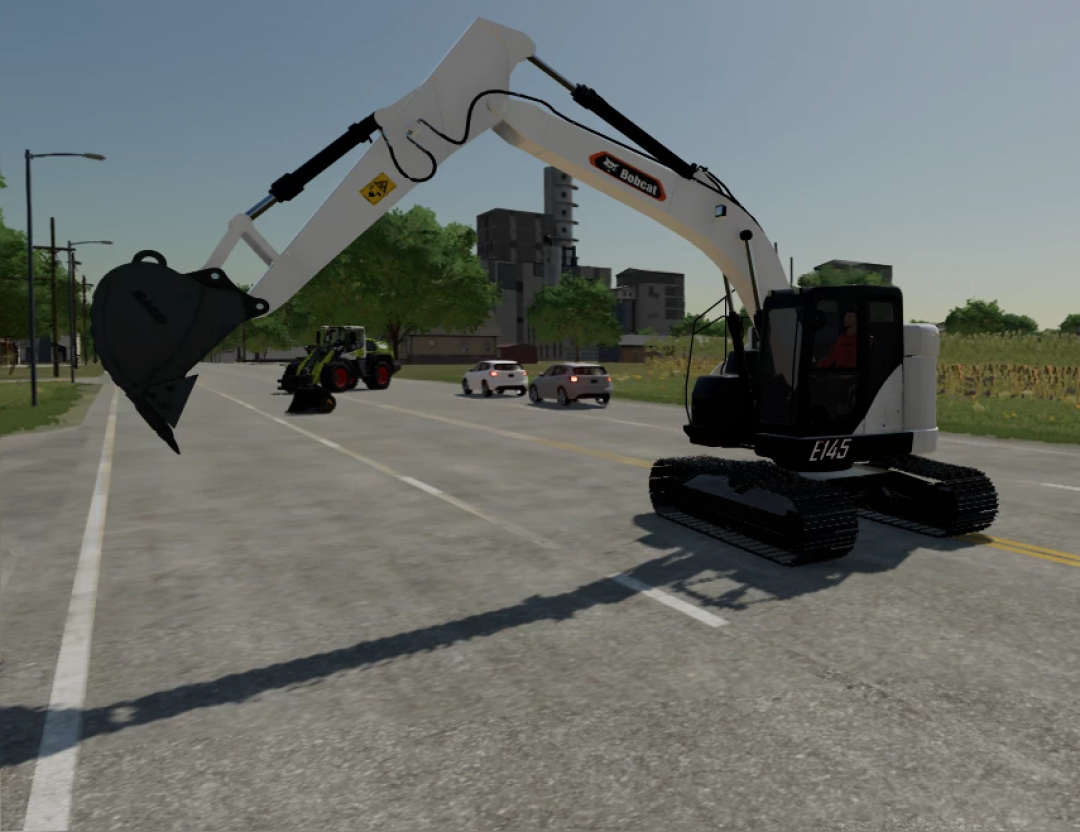 FS25 mod Bobcat E145 on a road, showcasing its arm extended, in Farming Simulator 25.