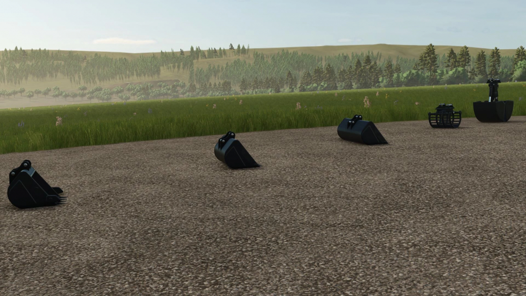 FS25 mods Bucket Pack Black v1.0.0.0 on a gravel surface with green field in background.