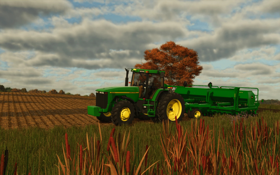 FS25 mod showcasing John Deere 1590 Drill v1.0.0.0 in a field with autumn trees, enhancing Farming Simulator 25 gameplay.