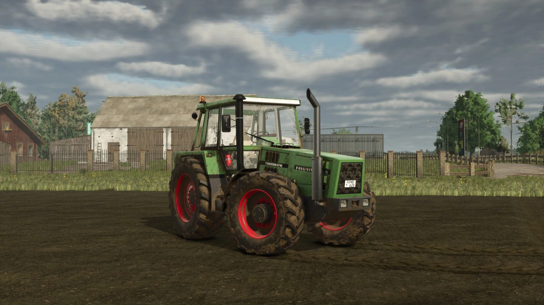 Fendt 620 tractor mod in Farming Simulator 25 with barn in background.