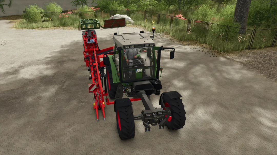 FS25 mods: Fendt Implement Carrier Pack v1.0.0.0 in Farming Simulator 25, showcasing a tractor with red implements in a farm setting.