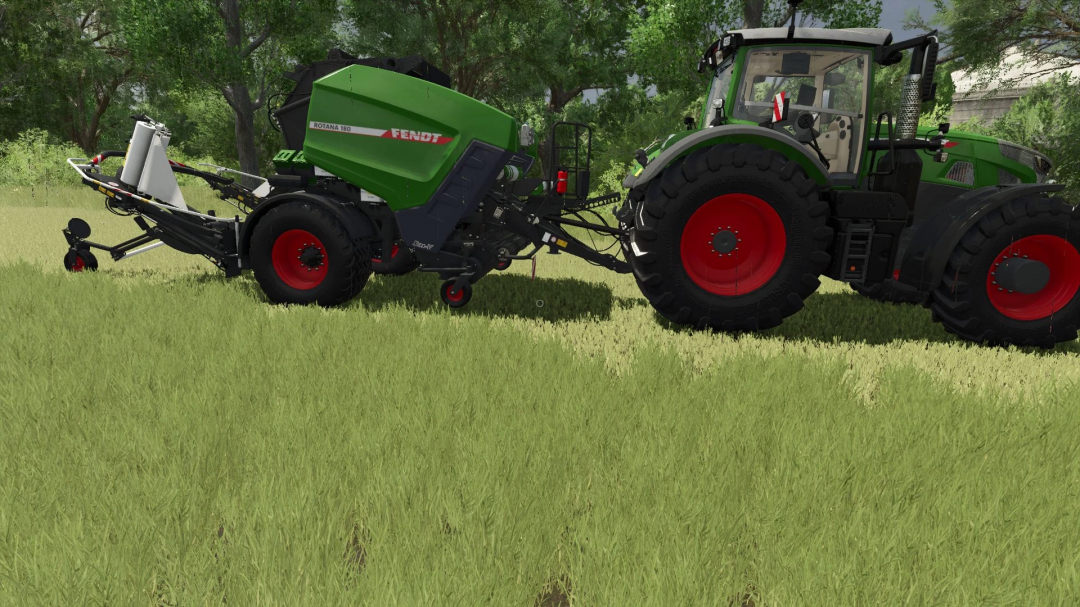 FS25 mod showing Fendt bale wrapper attached to tractor in a field.