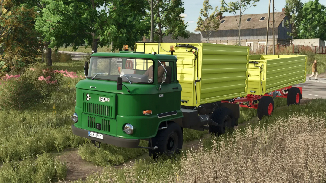 IFA L60 truck mod in Farming Simulator 25, green cab with yellow trailer, in rural setting. FS25 mods.