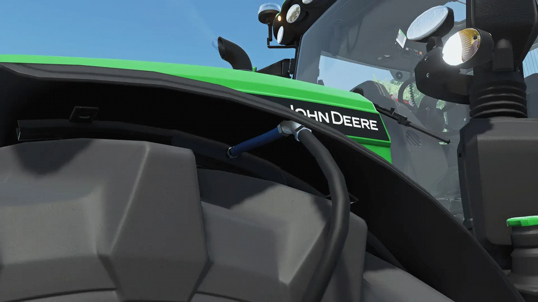 Close-up of the JOHN DEERE 6R XLarge tractor in FS25 mod showing detailed design.