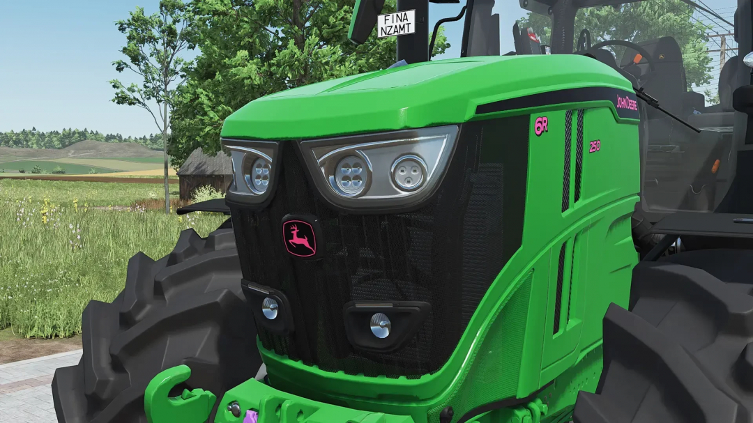 Front view of the JOHN DEERE 6R XLarge tractor mod in FS25, showcasing detailed headlights and grill design.