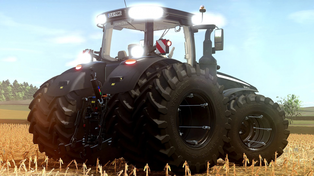 John Deere 8R 2016 Black Edition mod in FS25, showcasing a powerful tractor on a field.