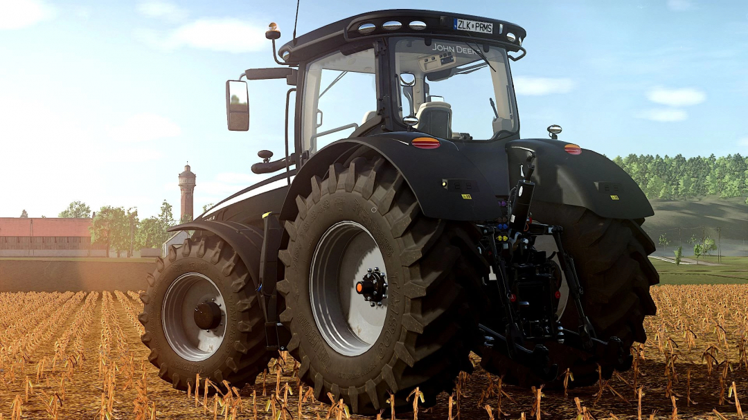 John Deere 8R 2016 Black Edition mod in FS25 on a sunlit field.