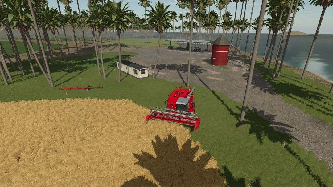 FS25 Lukah's Island mod showing a red harvester working in a field surrounded by palm trees and ocean view.