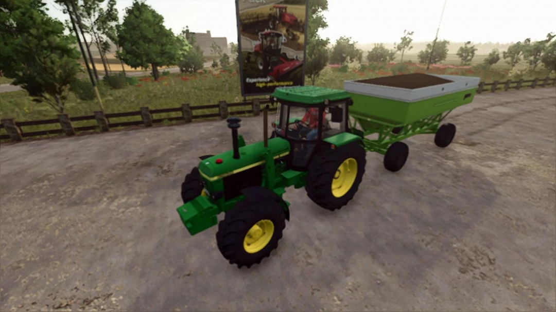 FS25 mod showcasing a green tractor towing the Parker 4000 Gravity Wagon on a farm road.