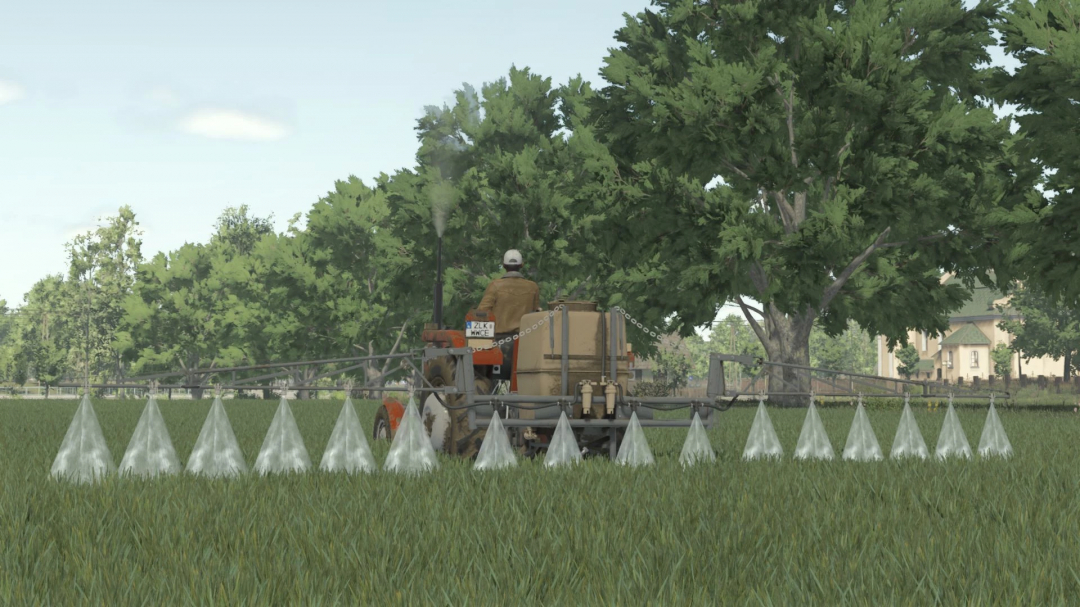 Pilmet P-031 Termit 303 mod in FS25, spraying field with tractor in a forested area.