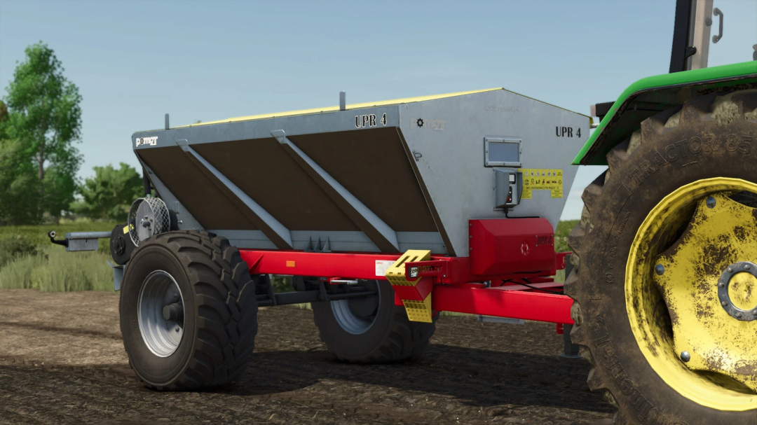 Pomot UPR 4 fertilizer spreader mod for FS25, shown attached to a tractor on a farm field.