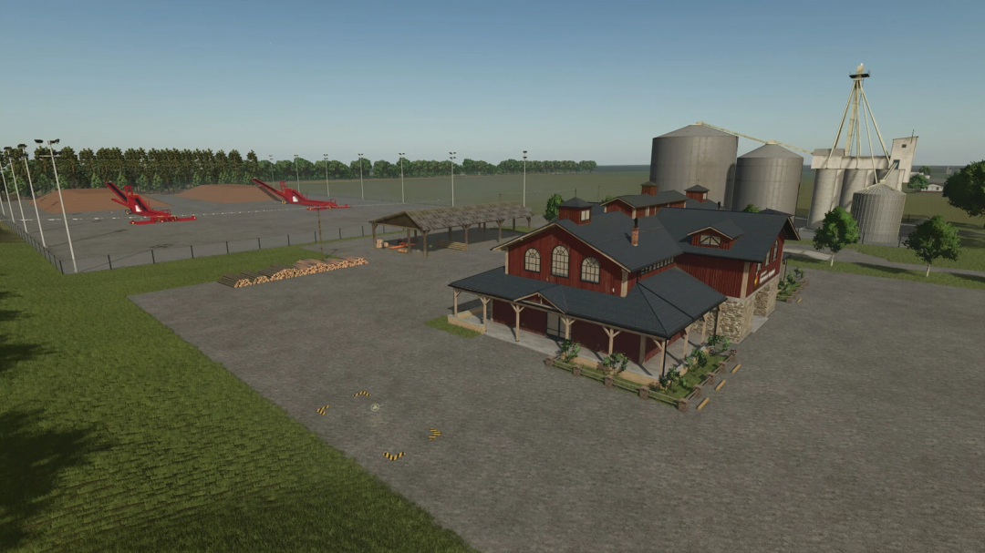 FS25 mod Prairie Farm Michigan v1.0.0.0 features a farm with silos, machinery, and buildings under clear skies.