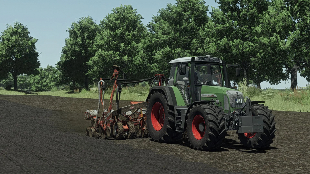 FS25 mod Shader By Swissi v1.0.0.0 showcases a tractor plowing a field with trees in the background.