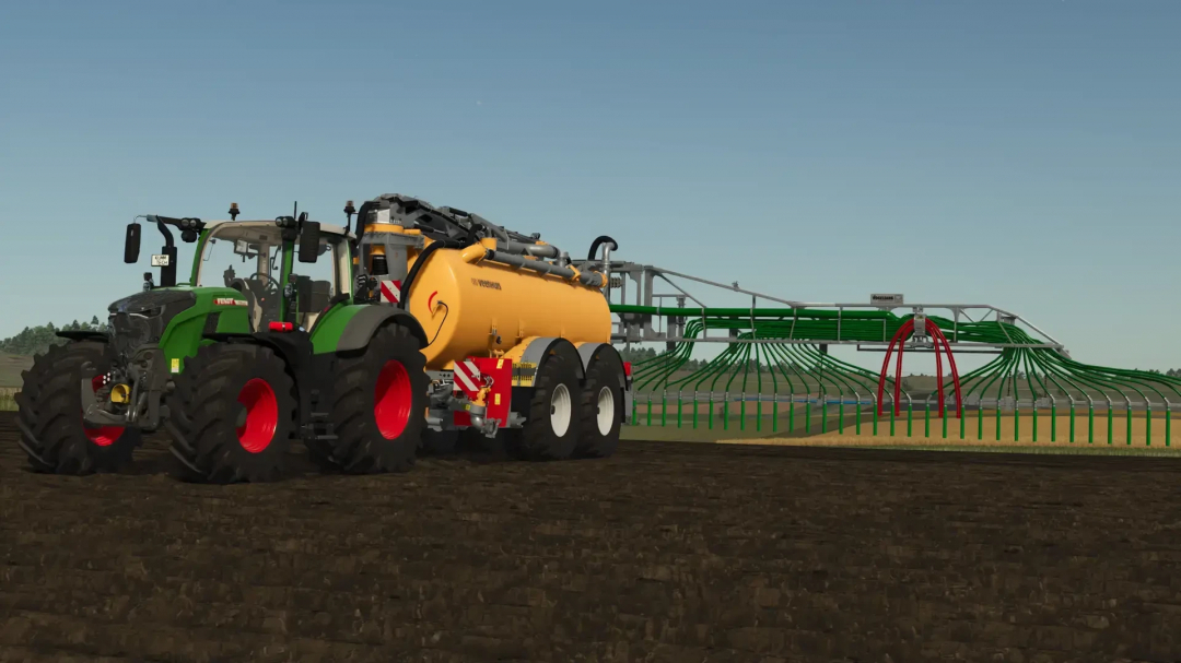 FS25 mod Vogelsang SwingMax 24 v1.0.0.1 attached to a tractor in a field.