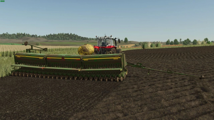 fs25-mods,  John Deere 455 Box Drill mod in FS25, cultivating a field with a tractor.