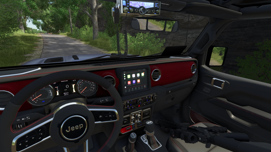 Interior view of a 2022 Jeep Gladiator Rubicon mod in FS25, showing dashboard details and road ahead.