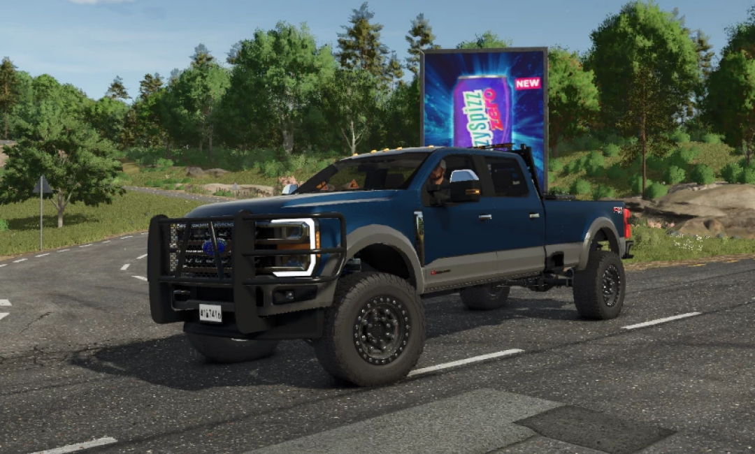 Blue 2024 Superduty King Ranch mod in Farming Simulator 25, parked on a road with lush greenery.