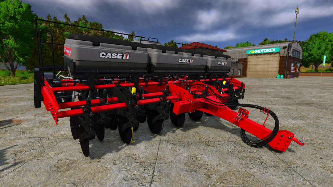 Case IH Easy Riser 3215 v1.1.0.0 mod for FS25, featuring a red and black seeder on a concrete farmyard.