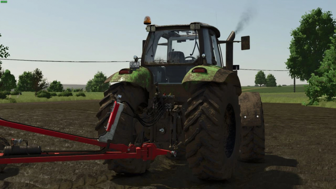 Rear view of Deutz Agrotron X710-30 tractor in FS25 mod, plowing a field.