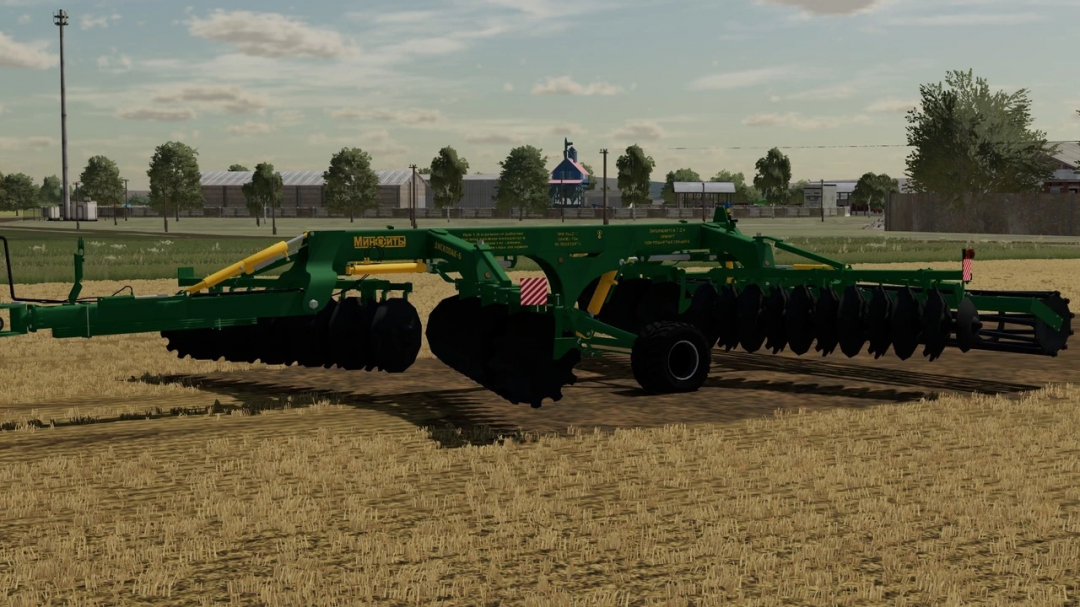 Diskopak 6-01 mod for FS22 showing a green farm cultivator on a field.