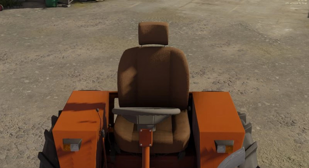 Driver's seat of orange tractor in FS22 Wladzio T25 edit mod for Farming Simulator 22.