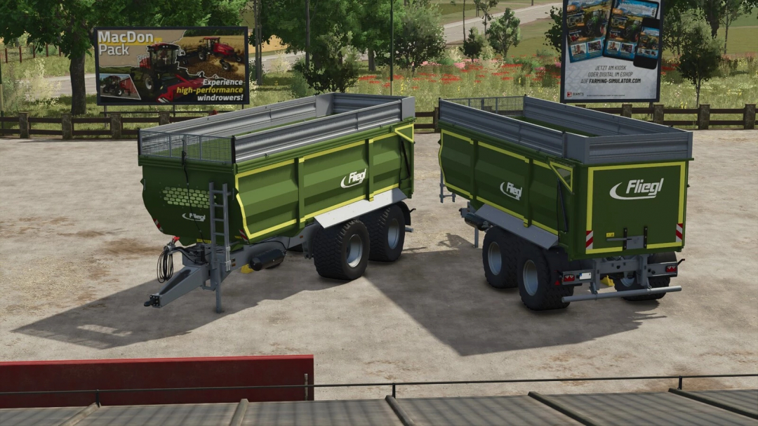 Fliegl TMK273 trailer mod in FS25, showcasing two green trailers in a farmyard setting.