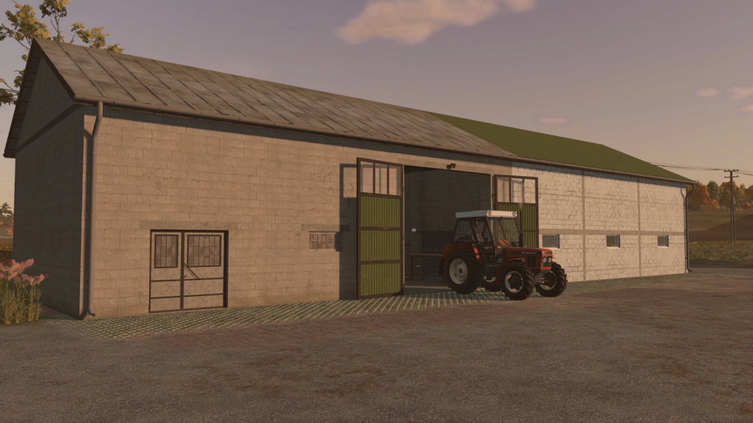 Hall Workshop mod for FS25 featuring a tractor parked outside an industrial workshop.