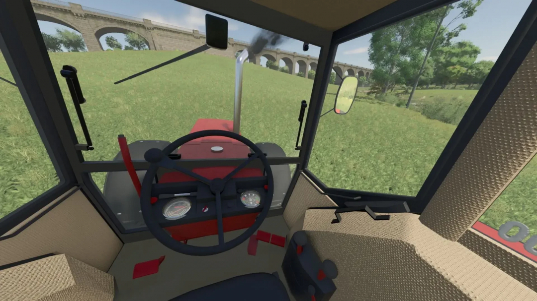 Interior view of IHC 1046 tractor mod in FS25, showcasing dashboard and steering under a stone bridge.