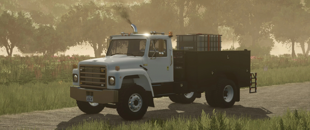 International S1800 Service Truck mod for FS25 in a rural setting.