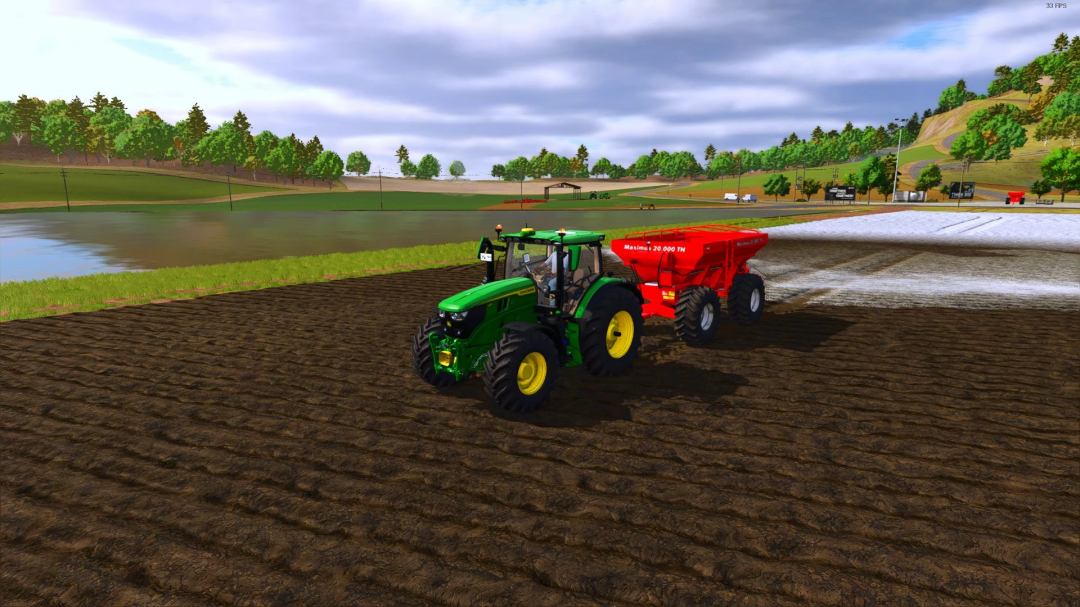 FS25 mods: Jan Maximus 20.000 TH v1.1.0.0 trailer attached to a tractor on a farm field.