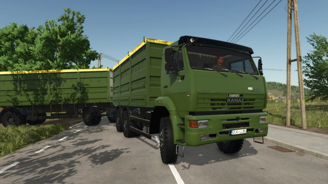 KamAZ-6522 truck pack mod for FS25 shown on a rural road.