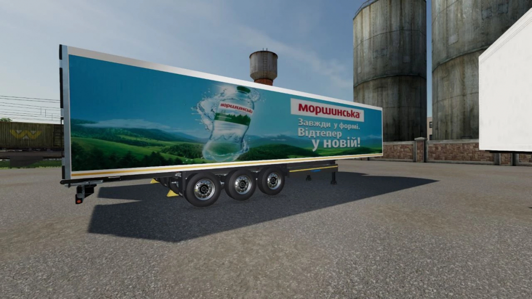 Krone Cooliner trailer mod for FS22 featuring a bottled water design parked near silos.