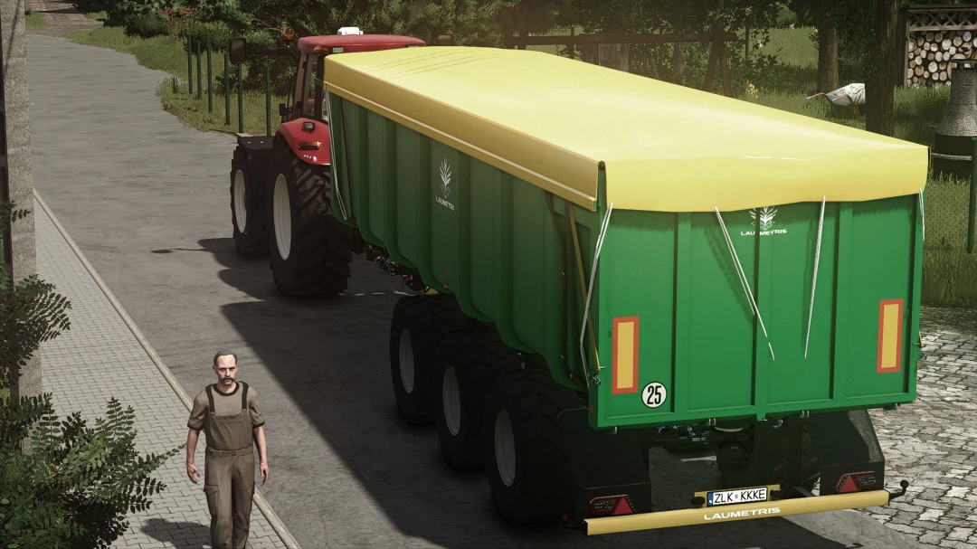 Laumetris PTL30 mod in FS25 showing a green trailer with a yellow tarp attached to a red tractor, a man walking nearby.