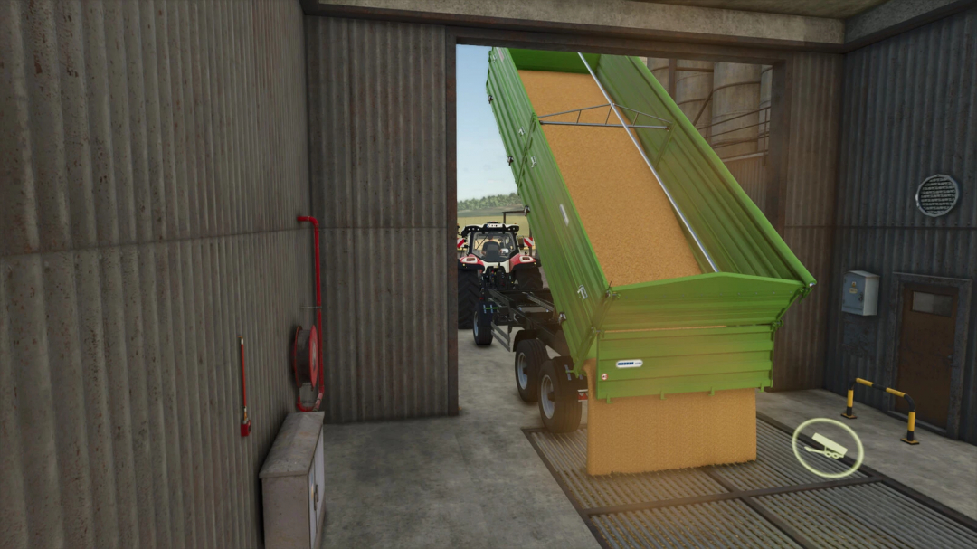 FS25 mod Madara Agro Dunav RNT Series trailer unloading grain in a barn.