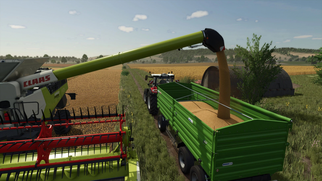 Claas harvester unloading grain onto a trailer in Farming Simulator 25, featuring the FS25 mod Madara Agro Dunav RNT Series.