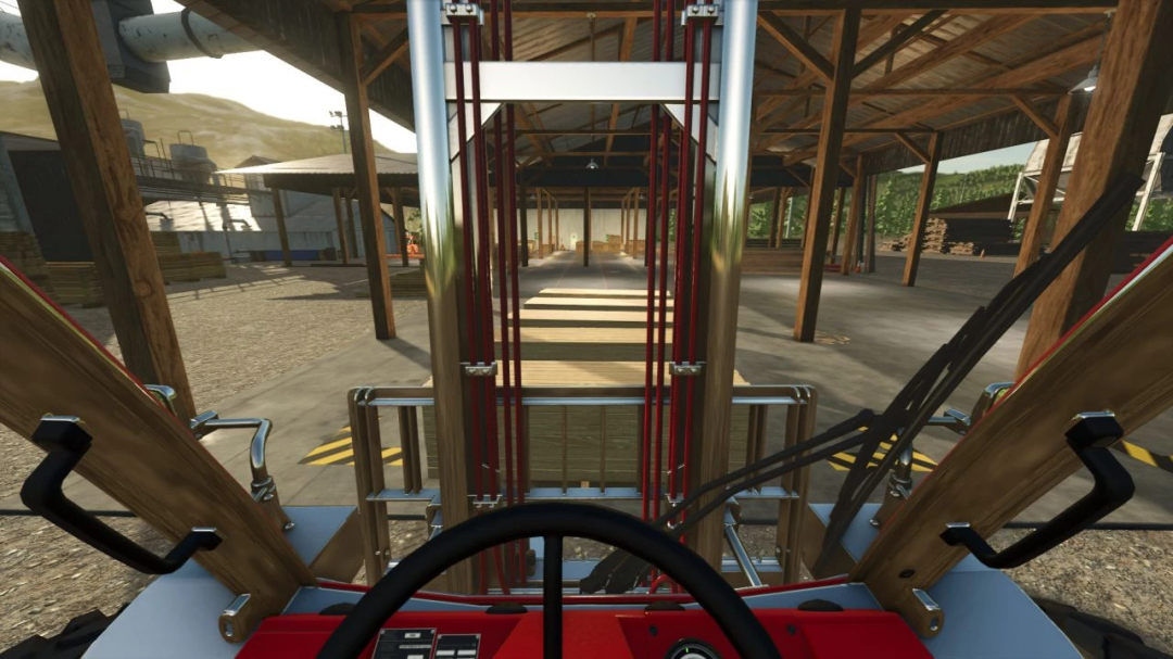 View from inside a Manitou forklift mod in FS25, showing the warehouse environment.