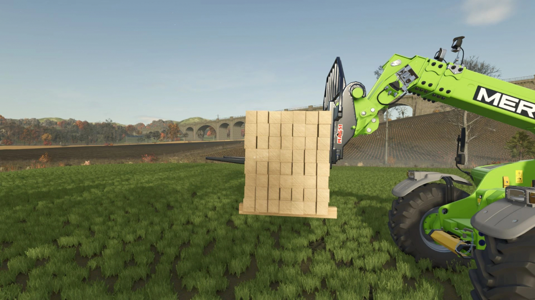 FS25 mod: Pallet Fork Pack with TensionBelt lifting wooden pallet on green tractor, open field backdrop.